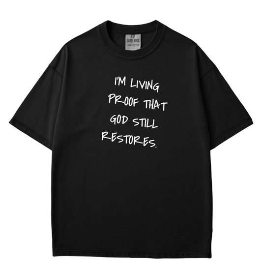 I'm Living Proof That God Still Restores - T-shirt